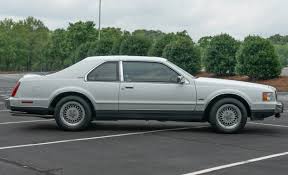 Image result for Silver 1990 Lincoln