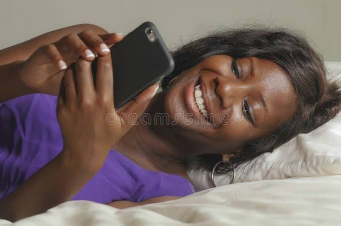 719 Black Woman Smiling Using Smartphone Bed Stock Photos - Free & Royalty-Free Stock Photos from Dreamstime
