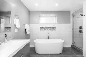 This gray tile bathroom layers subway tile with handpainted tile for an elevated take on new traditional style. 33 Black And White Bathroom Tile Ideas Designs Pictures