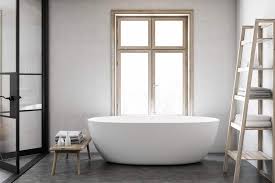 This primary bathroom offers a freestanding tub set on the hardwood flooring. 7 Best Freestanding Tubs 2021 Reviews Sensible Digs