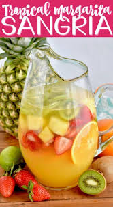 This Tropical Margarita Sangria Recipe Combines Sangria And Margaritas In The Most Beautiful Delicious Sangria Recipes Drinks Alcohol Recipes Margarita Sangria