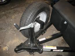 Carry a spare tire up and out of the way with this spare tire mount. Universal Spare Tire Shefalitayal