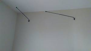 If your curtain rod features curtain rings, attach them to the rod as a part of this step. How To Stabilize Swing Arm Rods For A Bed Canopy Hometalk