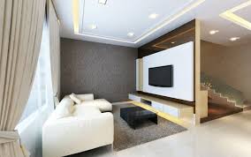 The twist pile carpet, choice of modern furniture, and the bright and bold patterns on the throw cushions, serve as nice garnishing to the overall taste of this living room design. Modern Interior Design Living Room Malaysia