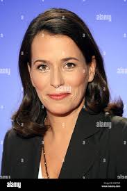 Anchorwoman of the ARD primetime news 'Tagesthemen' Anne Will smiles in the  studio of the NDR in Hamburg, Germany, Monday, 28 August 2006. Will was  born 18 March 1966 in Cologne, Germany.