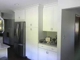 At first when i read your post, i thought the crown wouldn't look appropriate, but after seeing the pics, i totally agree. Crown Molding Where The Cabinets Do Not Meet The Ceiling See Pictures