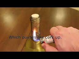 A handy video has shown how you can remove the cork within seconds then, use your lighter and put the flame on the neck of the bottle near to the cork in order to heat up the air underneath so it will expand. 6 Methods Of Opening A Wine Bottle Without A Corkscrew