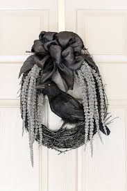 A playful and pretty spring hoop wreath. 46 Diy Halloween Wreaths How To Make Halloween Door Decorations