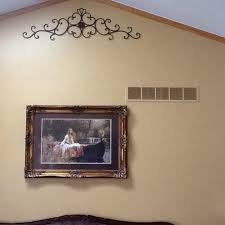 I have a room with an old brick floor. Air Return On Wall