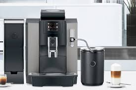 Iron gears over wooden background against view coffee beans and instant coffee. Bean To Cup Commercial Coffee Machine Suppliers Automatic Coffee Equipment Cool Beans Coffee