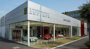 Ferrari Doubles Down On Japanese Market With Two New Dealerships Carscoops Car Showroom Design Cladding Design Car Showroom Interior