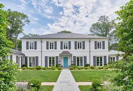 Porch with turquoise door and windows. Turquoise Blue Front Door On White Brick Home Transitional Home Exterior