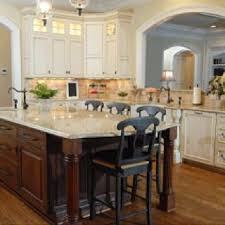 Cream Cabinets Brown Island Cream Counters I Love The Look Of This Kitchen Luxury Kitchens Interior Design Kitchen Luxury Kitchen Design