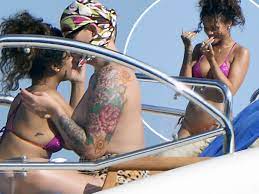 Rihanna enjoys intimate moment with topless woman while soaking up the sun  on a yacht - Mirror Online