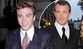As complicated as things were, he chose to stay with his dad in britain and traveled between his home and the united states. Rocco Ritchie Wears A Blue Three Piece Suit For Dinner With Friends Daily Mail Online