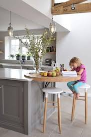 Find the right cookspace inspiration whatever your budget and space, take a look at these designer images below—there are plenty of kitchen island ideas and designs to inspire. A Floating Round Breakfast Bar Attached To The Kitchen Island And High Wooden St English Kitchens Design Kitchen Design Small Modern Kitchen Island