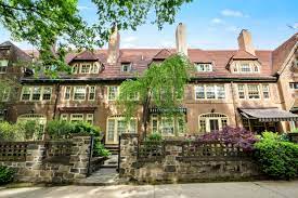 Coveted townhouse in Queens' enchanted Forest Hills Gardens lists for $2.5M  | 6sqft