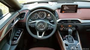 The redesigned signature interior offers amenities such as new captain's chairs and center console for the middle row. For The Anti Minivan Crowd How The Mazda Cx 9 Works For Families