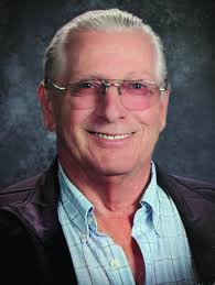 Charles “Chuck” B. White