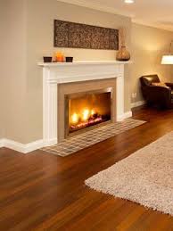 Walnut Floor With Great Contrast Of Whites Tans For The Rug Fireplace Tiles Wall Living Room Wood Floor Bedroom Wood Floor Living Room Color