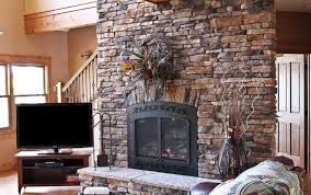 I think it has been almost exactly a year since my husband brought home a fireplace insert that he found off craigslist, yes, things take a long time to get complete. Get The Warmth Of Charming Stacked Stone Fireplace Design In Your Living Room Engineering Basic
