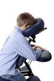 chair massage closeup of young boy sitting in a chair massage sponsored closeup massage chair young massage chair massage stock photography free