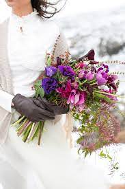 From which flowers are in season to the colours that'll match your beautiful winter wedding theme, here are plenty of winter wedding bouquets (and buttonholes, and floral centrepieces) to inspire you. 5z0b3712 Ruffled Purple Wedding Flowers Winter Wedding Flowers Wedding Flowers Summer