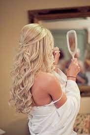 Down curly wedding hairstyles half up half down wedding hairstyles have a carefree look too and it is easy to carry which is good wedding hairstyles: 20 Awesome Half Up Half Down Wedding Hairstyle Ideas Elegantweddinginvites Com Blog