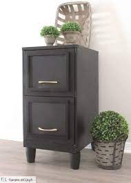 Drill shelf support holes that match the existing holes inside the cabinet. Easy Filing Cabinet Makeover