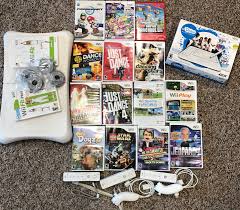 Assorted Wii Games And Accessories