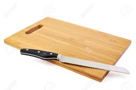 Maybe you would like to learn more about one of these? Steel Kitchen Bread Knife On The Wooden Cutting Board Isolated Over White Background Stock Photo Picture And Royalty Free Image Image 20557055