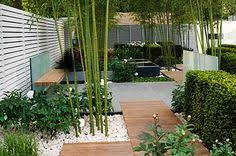 We've seen a move away from solid pavements and a favour towards cut out pavers lining pathways, interspersed with round stones. 37 White Pebbles Ideas Garden Design Outdoor Gardens White Pebbles
