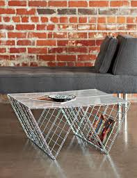 The stainless steel base is well crafted so that the tempered glass top floats softly on top of it. 16 Wire Coffee Table Ideas