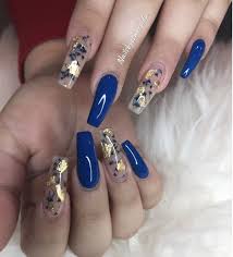 20 gorgeous gold acrylic nail ideas. Blue Coffin Nails Gold Flakes And Flowers Gold Acrylic Nails Blue Gold Nails Blue Foil Nails