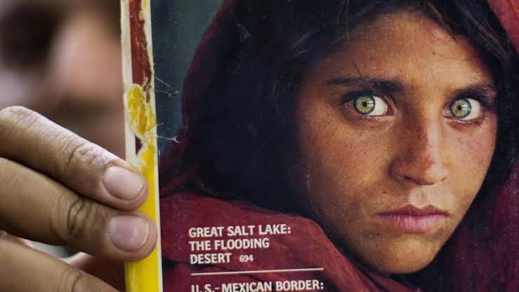 'Green eyed' Afghan girl evacuated to Italy