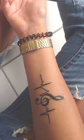 This is one of those music tattoos for women. Womens Small Arm Tattoos Arm Tattoo Sites