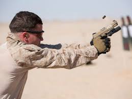 (firearms, gunnery, ordnance & artillery) ( tr) to shoot with a pistol. History Of The Pistols And Sidearms The Us Military Has Used