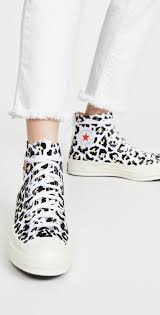 A classic pair of chuck taylor high tops reinvented with a bold twist. Converse Chuck 70 Logo Play High Top Sneakers Shopbop