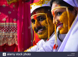 Bride and groom at turmeric ceremony at Indian wedding Stock Photo ...