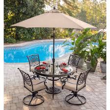Traditions 5 Piece Dining Set In Tan With 48 In Glass Top Table 9 Ft Table Umbrella And Umbrella Stand Tradd Patio Outdoor Dining Set Outdoor Dining Area