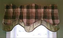 Royal black swags over holdback style. Window Valance Wikipedia