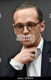 In a Saturday March 17, 2018 photo, Marvin Greer of Ben Wheeler competes in  the Motorized Barstool Races held in downtown Ben Wheeler, Texas, in  conjunction with the town's annual St. Patrick's
