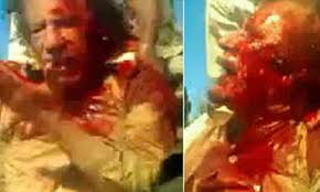 He returned to libya from the us during the uprising and later became the commander of the libyan national army (lna). Gaddafi Dead Video Dictator Begs For Life Before Summary Execution Daily Mail Online