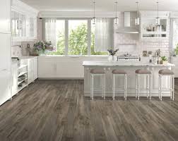 Waterproof hardwood flooring is natural hardwood, pine, or bamboo that has been enhanced by technology to make it impervious to liquid. Differences Between Waterproof Water Resistant Laminate