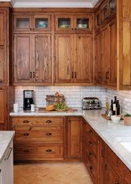 Marble Counter Tops White Subway Backsplash Tanish Floor Tile In A Craftsman Kitchen Home Kitchens Kitchen Cabinets Decor Kitchen Cabinet Design
