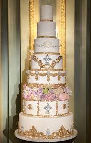 Check spelling or type a new query. 8 Tiers Wedding Cake With Gold And Silver Decorations Only Bottom Tier Is Real Cake Size Start With 8 Tier Wedding Cakes Gold Wedding Cake Tiered Wedding Cake