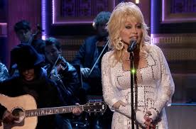 Parton met dean in 1964 on her first day in nashville at the wishy washy laundromat. Dolly Parton Says Her Husband Fantasizes About A Threesome With Jennifer Aniston Billboard Billboard