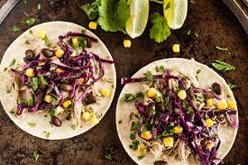 The typical pulled pork sandwich is piled on buns and served with coleslaw (on the pork or on the side), extra barbecue sauce, dill pickle slices, and your favorite side dishes. Skip The Food Truck Pulled Pork Tacos