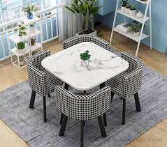 This table can accommodate up to four people comfortably, with standard dining height chairs. China Two Layer Glass Top Dining Table Pu Leather Chair Coffee House Square Round Shape Table Set With 4 Chairs China Living Room Furniture Home Furniture