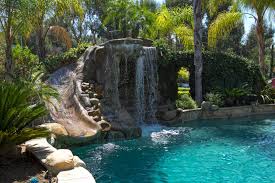 Affordable Pool Grotto With Slide Designs Premier Pools Spas
